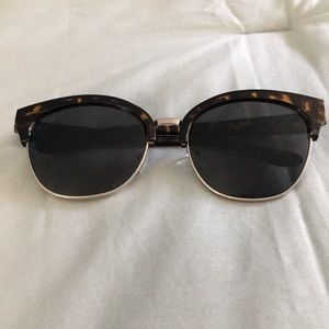 Clubmaster style sunglasses